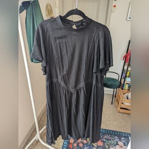 Black Torrid dress with high neck and lace detail, plus size